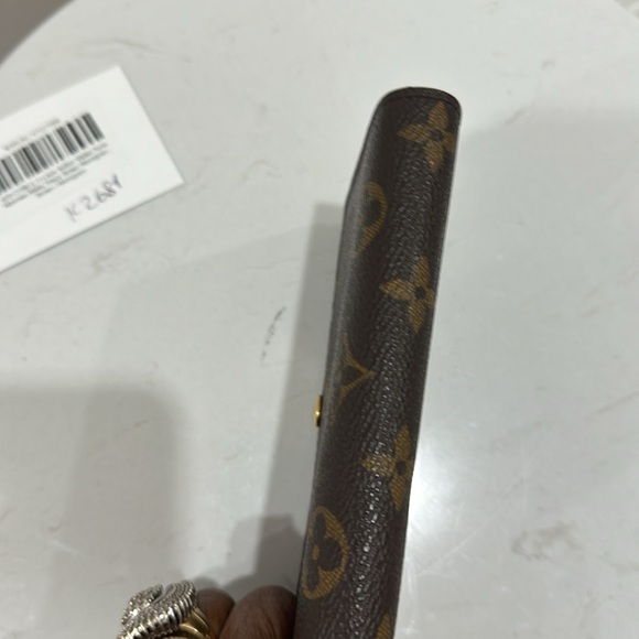 Authentic Louis Vuitton short monogram wallet, with zipper interior.  Unisex - Picture 5 of 9